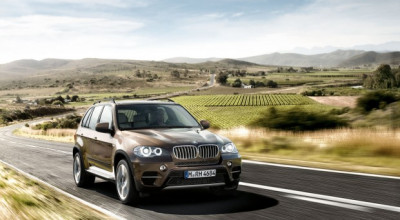 5 BMW X5 = -25% - Photo