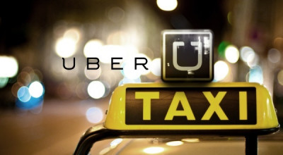 Uber gata să cedeze pentru a-şi întoarce licenţa londoneză! - Photo
