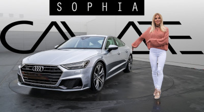 O blondă focoasă prezintă noul Audi A7 Sportback în detaliu - Photo