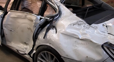 A readus la viaţă un BMW Seria 7, făcut zob într-un accident, în doar 27 de zile! - Photo