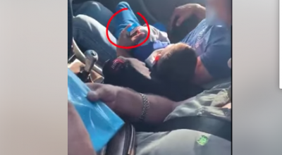(VIDEO) Se deplasa fără centura cuplată și fumând lângă copilul transportat pe scaunul din față! Șoferul riscă 4.800 lei amendă - Photo