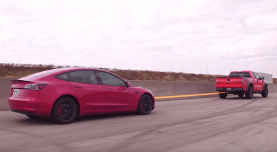 Cât te costă să încarci bateriile unei Tesla Model 3, utilizând un Ford Raptor pentru tractare? - Photo
