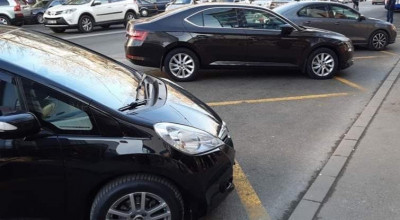 De râs și de plâns. Moldovenii parchează în continuare după marcajul din stațiile de troleibus - Photo