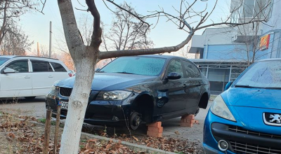 Încă un automobil, deposedat de încălțările de iarnă, în capitală! - Photo