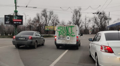 ”Sunt Porc”, este mesajul cu vopsea lăsat pe o mașină din oraș! - Photo