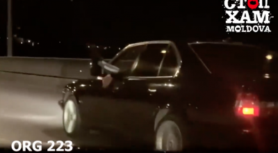 S-a dat în spectacol conducând un BMW cu piciorul scos pe geam! Comportamentul indecent l-a costat 1.500 lei și 3 puncte de penalizare - Photo