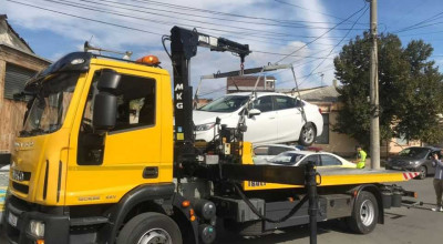 Vezi poze pe viu cu procesul de evacuare a mașinilor parcate neregulamentar pe străzile din Chișinău Vezi poze pe viu cu procesul de evacuare a mașinilor parcate neregulamentar pe străzile din Chișinău - Photo