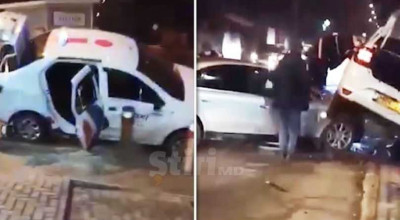 (VIDEO) Accident în capitală! Un Audi a luat pe capotă o mașină de taxi - Photo