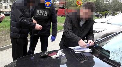 Rețea de falsificatori de acte, destructurată. Contrafăceau documente oficiale și le vindeau în Moldova, și peste hotare - Photo