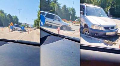 Un șofer a rămas cu mașina blocată în betonul proaspăt turnat pe str. Calea Orheiului - Photo